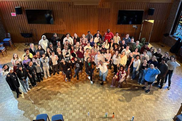 Sweet Honey in the Rock® group photo with university and local high school choirs